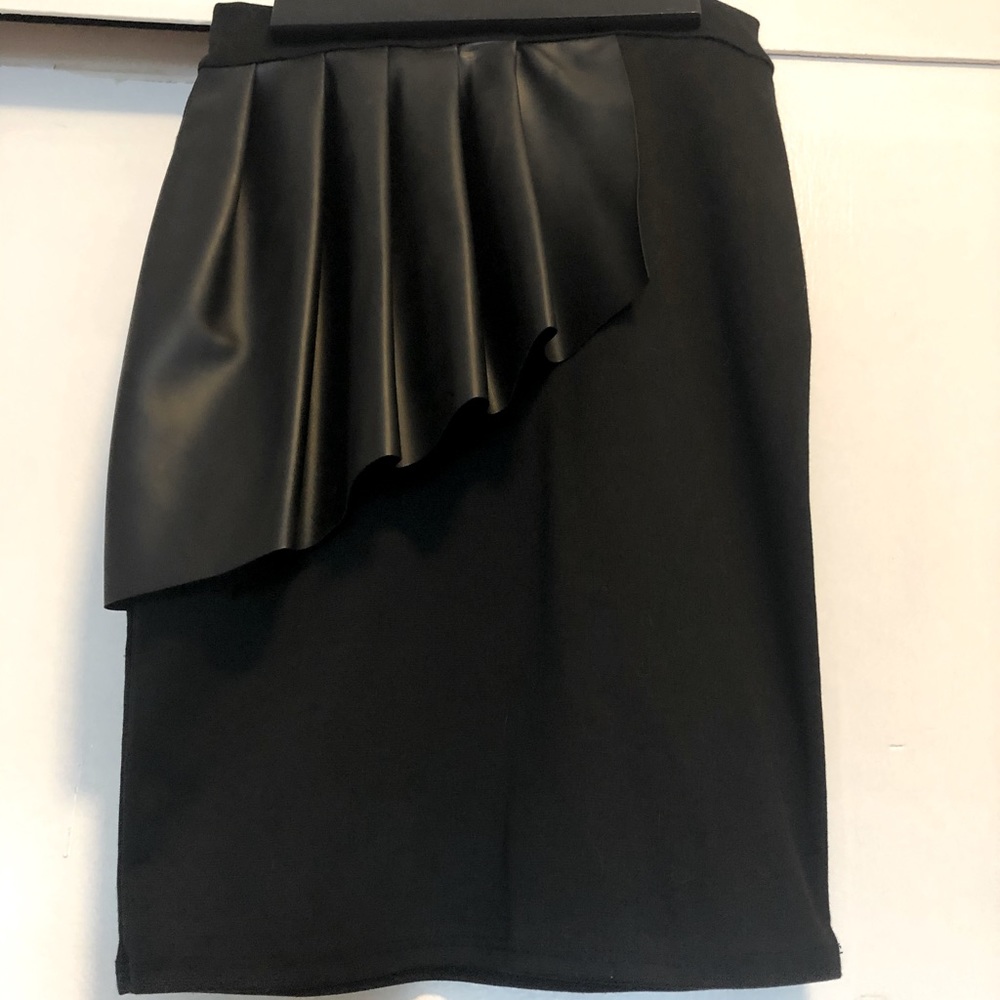 Peplum style skirt with faux leather detail